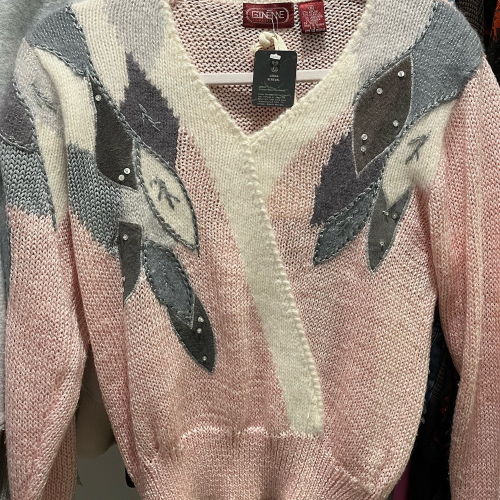 Elegant V-Neck Sweater with Leaf Design
